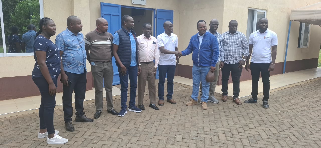 CarboDeep founder Jeremiah Muia at the Mwea Irrigation Scheme Station office during a meeting with National Irrigation Authority officials.